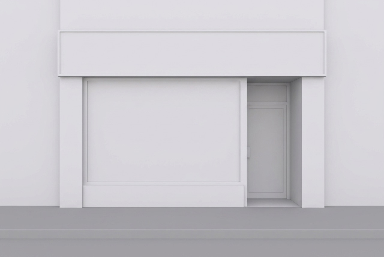 Untextured white clay model of a shopfront with a wide fascia band, a large window and a recessed glazed door